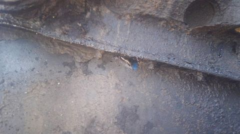 1996 Ford Bronco - pulled the engine. not good finding a spot on each side of the oil pan with a hole in it