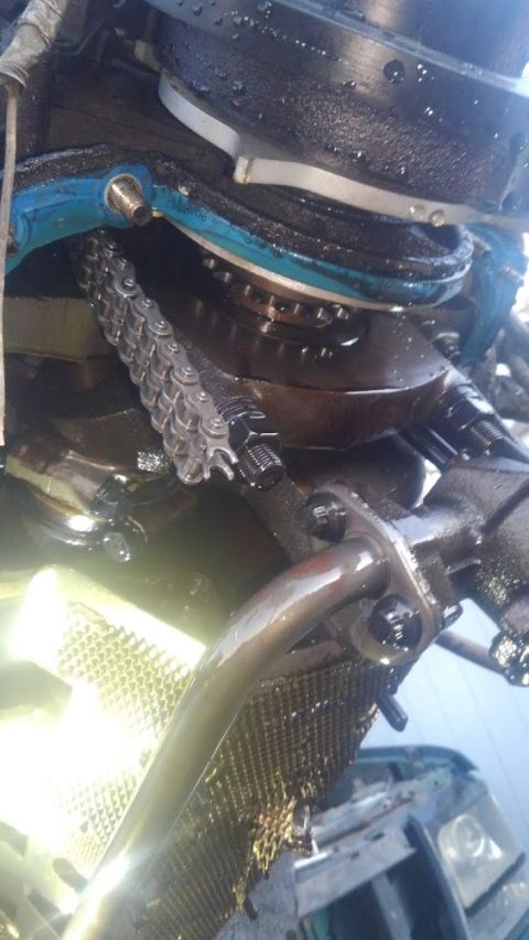 1996 Ford Bronco - pulled the pan. catastrophic failure broken timing chain, but that is least of concern