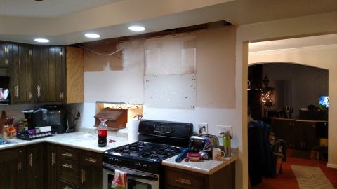 1980 Yugo Vega - This kitchen is undergoing a remodel, with exposed walls and appliances visible.
