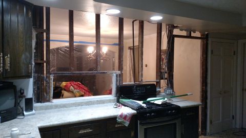 1980 Yugo Vega - This kitchen is undergoing a remodel, with exposed framing and construction materials visible.