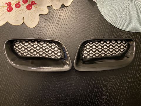 2000 Pontiac Grand Prix - Pair of aftermarket hood vents with mesh inserts.