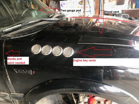 2000 Ford Explorer - Customized car fender shows 'XEDGE' emblem and multiple vents, with notes about needed bodywork.