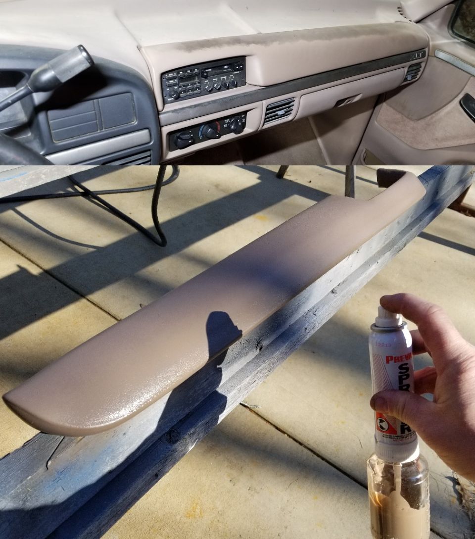 Dashboard of an older truck with a spray-painted trim piece on sawhorses
