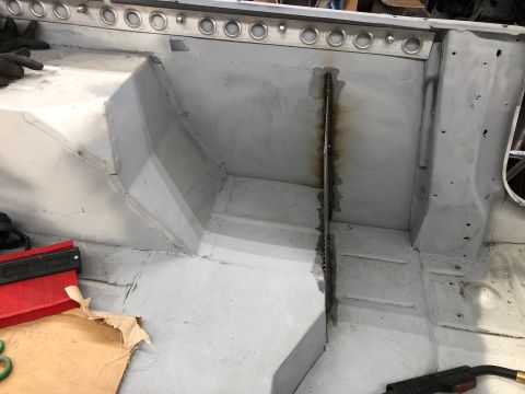 1992 Jeep Wrangler - Vehicle body interior undergoing repair work, showing seams and bracing.