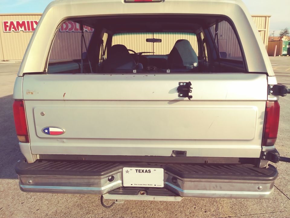 Rear view of a 1996 Ford Bronco with a Texas license plate