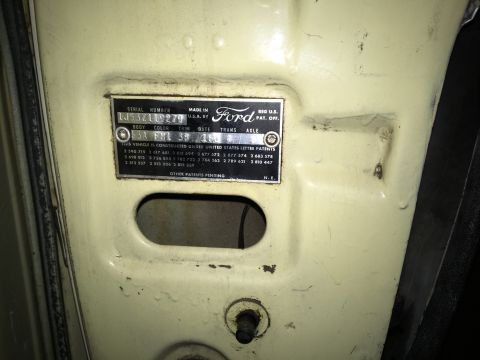 1961 Ford Starliner - A close-up of a Ford VIN plate, providing vehicle identification details.