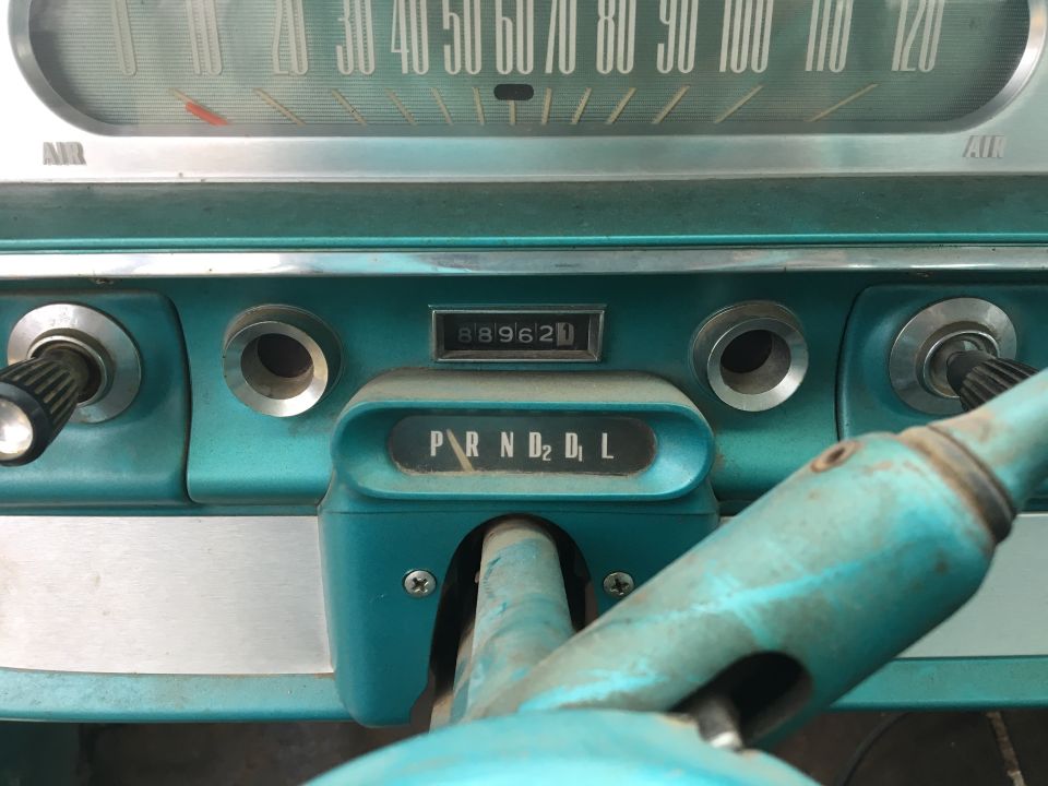 1960 Ford Starliner interior with turquoise dashboard, speedometer, and PRND2L gear selector