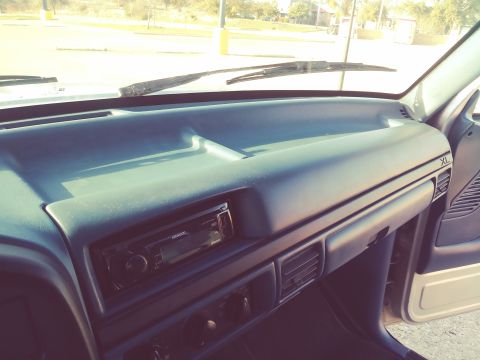 1996 Ford Bronco - Interior view of a vehicle's dashboard, showing the stereo and air vents.