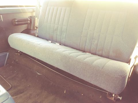 1996 Ford Bronco - Interior view of the rear bench seat in a 1996 Ford Bronco.