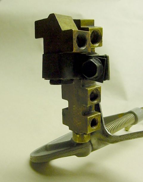 1969 Mercury Marquis - Picture of the valve assembly from my car oriented like the service manual diagram. It appears that originally, the bracket was permanently…