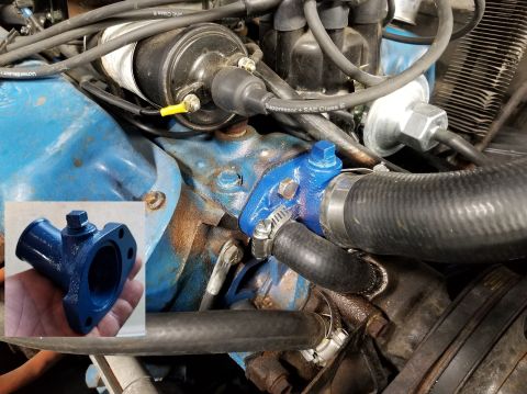 1974 Ford Bronco - This crappy imported t-stat cover required a LOT of grinding & filing of the nipples so the hoses would seal. Then it was painted DupliColo…