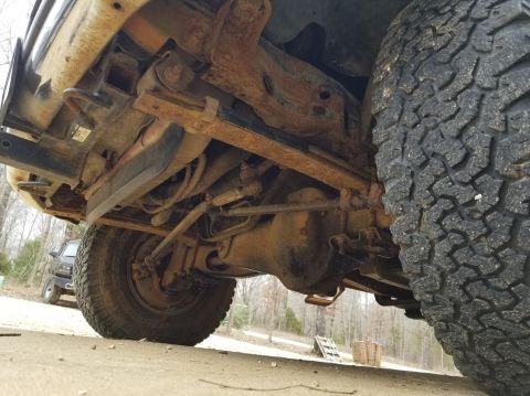 1997 Ford F-250 - Left frame front The PO said he used the front receiver for a winch. Judging by the mud inside the bedwalls, he probably should have used i…