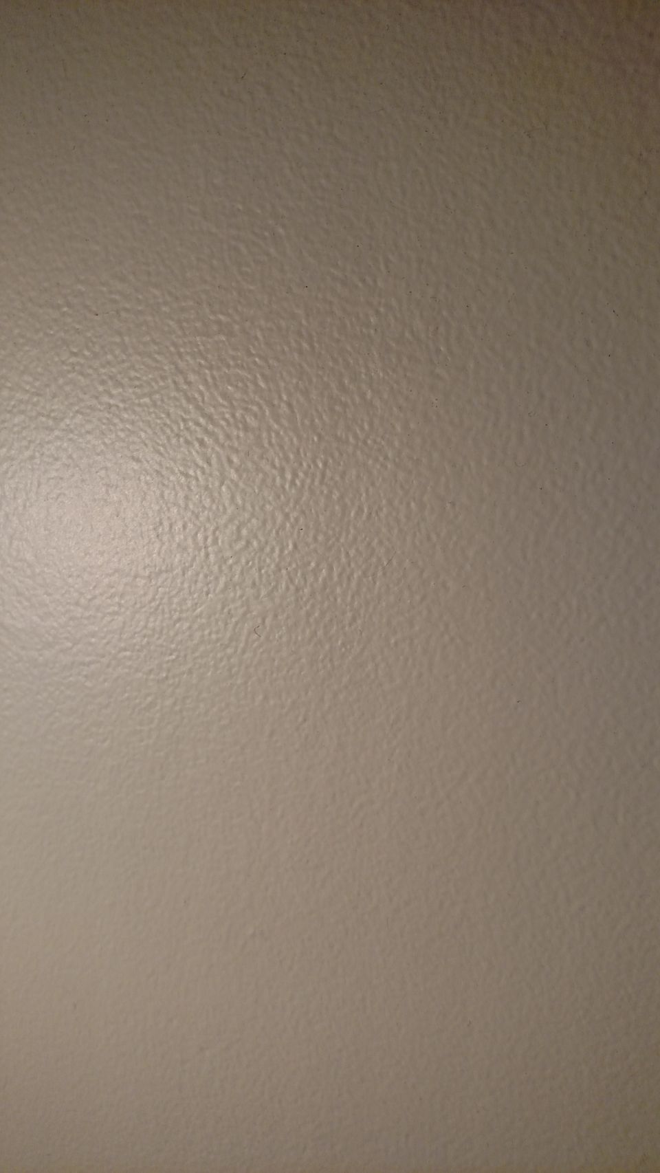 Textured wall with subtle shadows