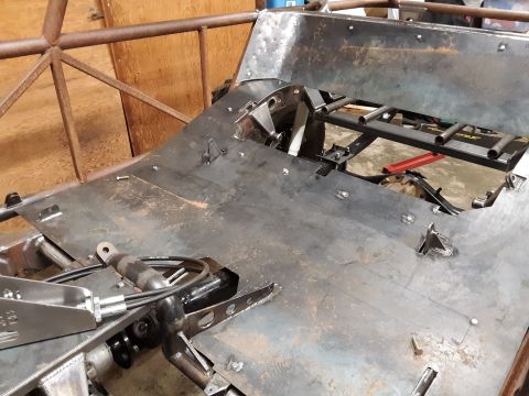 1985 Toyota Hilux - Close-up of custom metal fabrication work, showing structural components and hydraulic lines.
