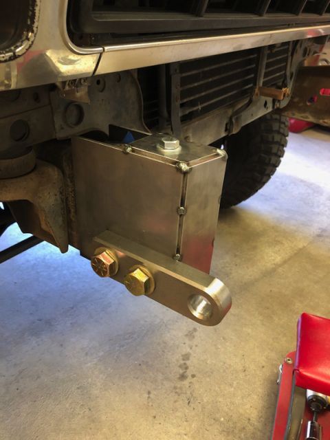 1981 Ford Bronco - Close-up of a custom metal bumper attachment on a vehicle's front end.