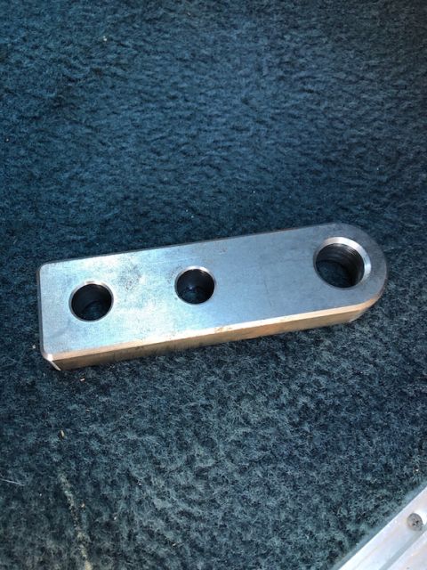 1981 Ford Bronco - Metal bracket with three holes, likely a custom or replacement part.