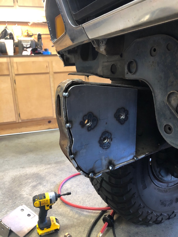 Custom bumper fabrication with welded metal plates and three bolt holes