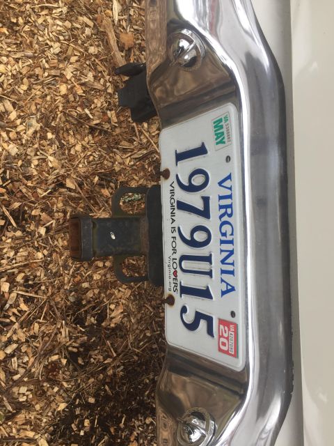 1979 Ford Bronco - Close-up of a vehicle's rear bumper, trailer hitch, and a Virginia license plate showing the year 1979.