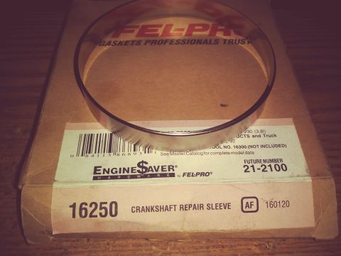 1996 Ford Bronco - A close-up of a new engine part, a crankshaft repair sleeve, packaged by Fel-Pro.