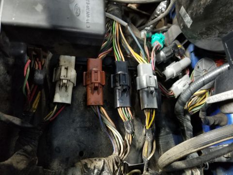 1989 Ford Bronco - The engine wiring is in surprisingly-good condition, but it's still using the old Ford-style relays (under the black cover, top Left). The…