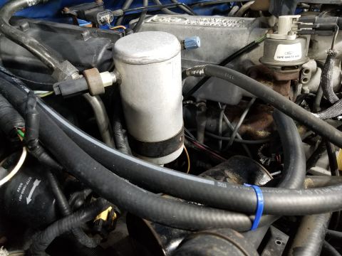 1989 Ford Bronco - The A/C appears to have been partially converted to R134a, and many of the coolant hoses have been replaced with Gates. The coffee can is r…