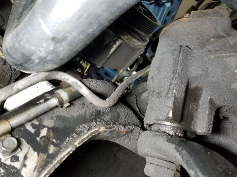 1989 Ford Bronco - There's a fluid leak from the return hose at the cooler, but not much from the pump itself. The shiny splines on the steering box sector sh…
