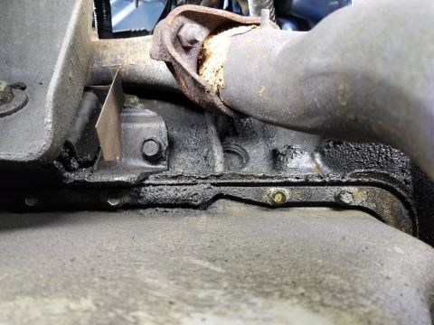 1989 Ford Bronco - As usual, all the oil leaks collect along the pan lip. It's not apparent from this angle, but the engine mounts are broken. [url=https://ww…