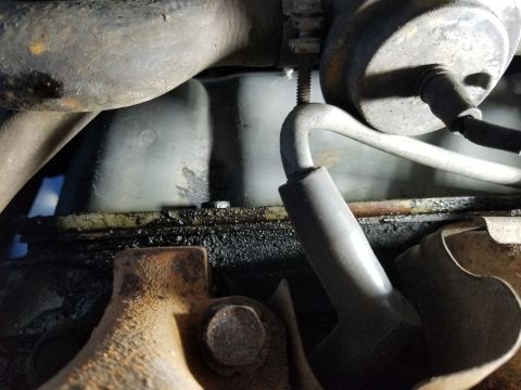 1989 Ford Bronco - The valve cover gasket oil is streaming down the RHR corner of the block (Left in the pic) keeping a semi-clean trail there. There are some…