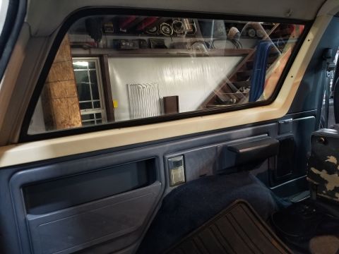 1989 Ford Bronco - The cargo carpet is replacement, but made fairly well. It was cut instead of being installed under the seat brackets; and the wheelwell car…