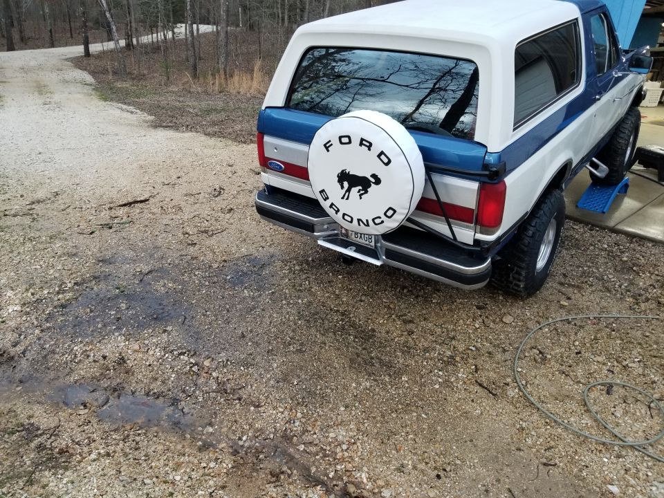 Most of the black grime on the white gravel came from this truck.  And after it dried and I got back under it, I couldn't really tell that it had been pressure-washed - there was still that much more.  Many of the dirt-dauber nests survived, too.