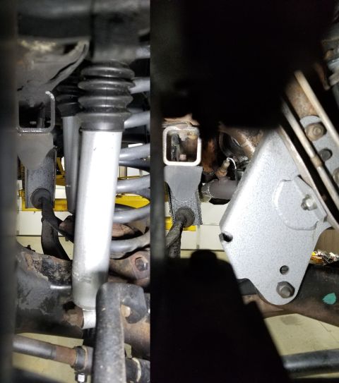 1989 Ford Bronco - The Left radius arm drop bracket appears OK, but the Right has a noticeable angle, indicating the frame is twisted. Although the radius arm…