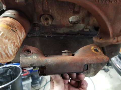 1996 Ford Bronco - Left engine mount broken; and also bent by whoever almost installed this rubber plug.
