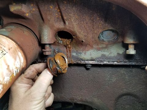 1996 Ford Bronco - Left front rubber plug not fully installed