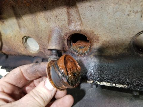 1996 Ford Bronco - Right middle rubber plug not fully installed