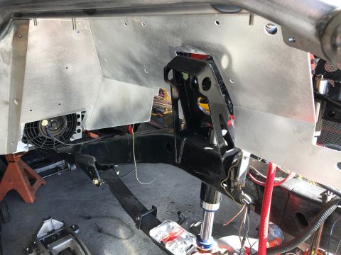 1992 Jeep Wrangler - This image shows the underside of a vehicle build, focusing on the suspension and frame area. A black shock absorber is visible, mounted to…