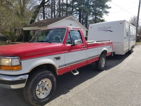 1997 Ford F-250 - First pull: a little 28' TT going about 100 miles. Even though the weather was cool (max ~60Â°F), the temperature gauge came up for the fir…
