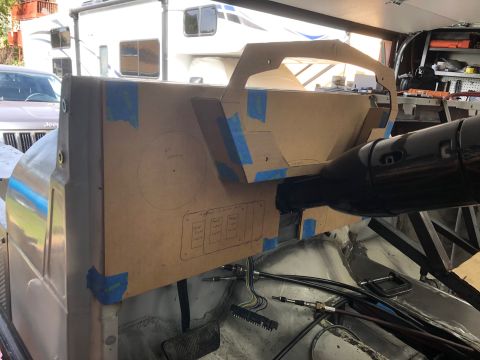 1992 Jeep Wrangler - A cardboard template for a custom dashboard is taped into a vehicle's interior. The template has cutouts for gauges and switches, and a ste…