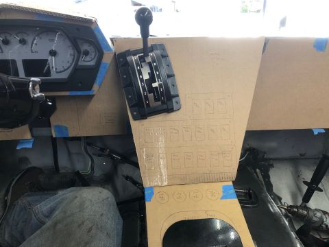 1992 Jeep Wrangler - A cardboard mockup of a custom dashboard is shown in a vehicle. The mockup includes outlines for gauges, a gear shifter, and a panel of swi…