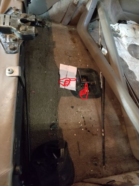 1996 Ford Bronco - Rear seat strike bar sleeve is missing, and amp ground terminal is under a bolt