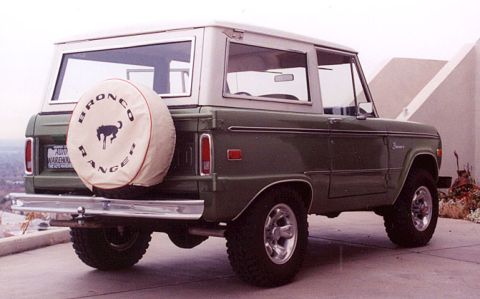 1973 Ford Bronco - Rear view of a 1973 Ford Bronco, showing the spare tire and rear bumper.
