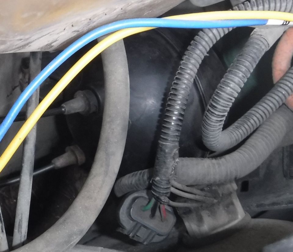 '80s F-series vacuum reservoir tucks in perfectly below the coolant/washer reservoirs and headlight.