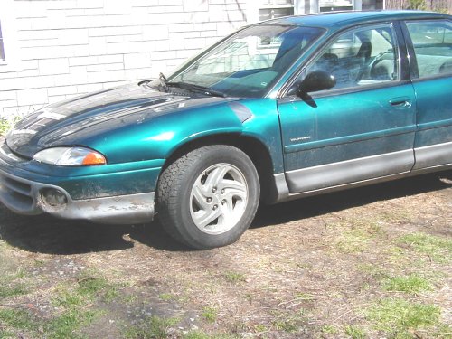 1995 Dodge Intrepid sedan, green, parked outdoors