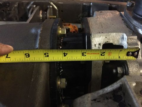 1985 Toyota Hilux - Measuring a part with a yellow Stanley tape measure. The measurement is around 4 inches.