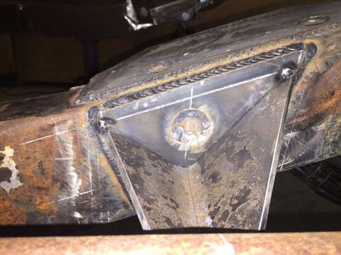 1985 Toyota Hilux - This image shows a close-up view of a welded metal frame, likely part of a vehicle chassis or structural component.