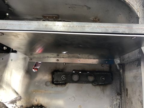 1992 Jeep Wrangler - Close-up view of the interior metal structure, showing hinges and mounting brackets.