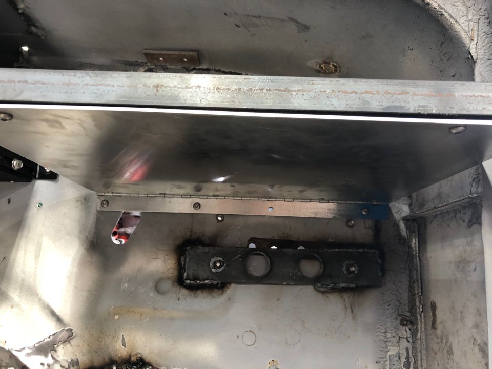 Interior metal paneling with hinges and brackets