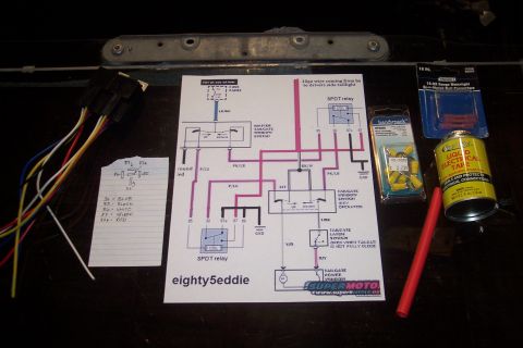 1995 Ford Bronco - A diagram and parts laid out for automotive electrical work, possibly for a relay system.