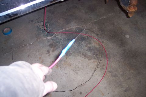 1995 Ford Bronco - Repairing electrical wiring on a vehicle part.