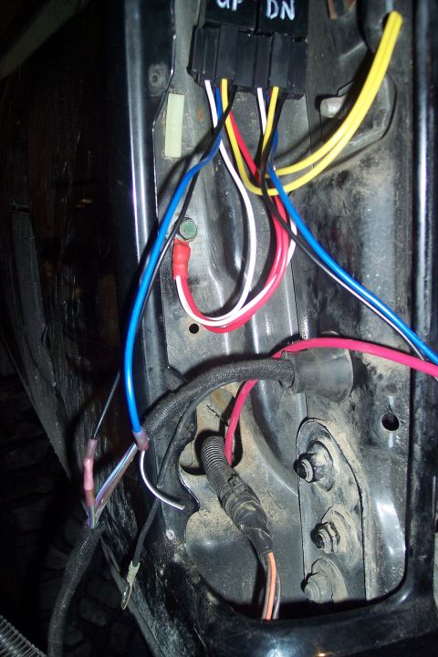 1995 Ford Bronco - Wiring harness and relay block with multiple colored wires visible.
