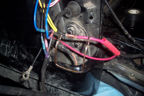 1995 Ford Bronco - Detail of a vehicle's electrical system, showing various wires and connections, likely related to a relay module.